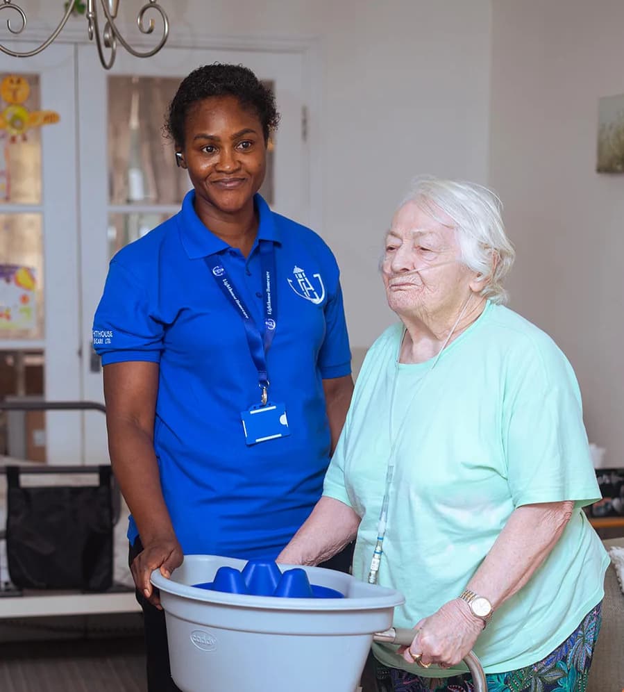 Caregiver providing post-hospital recovery support to elderly person